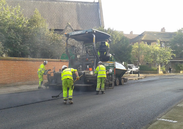 asphalt road lay workers